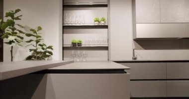 Elegant and Comfortable Home at Dining room. Leather modern gray chair in kitchen room and dining table. Modern Minimalist Home. Modern gray and white kitchen room furniture with marble table.