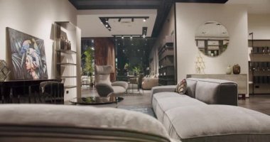 Modern Gray fabric sofa and Armchair. Textile upholstery sofa with pillows. Modern and Loft Apartment, Beautiful white sofa in the modern living room. Modern Sofa in Home. Scandinavian interior.