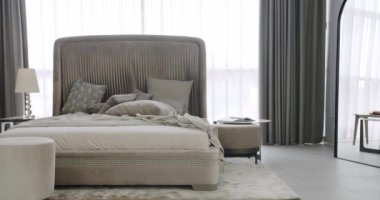 Elegance interior design. Minimalist Bedroom. minimalistic scandinavian style of interior. Elegant and Simple Bedroom With a King Sized Bed. Neoclassical Interior of modern luxury bedroom.