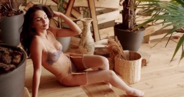 Sexy woman in elegant brown underwear. sexy girl.Sexy young woman in brown lingerie.The girl in the underwear.Portrait beautiful sexy girl posing in lingerie.Seductive girl looking camera with passion