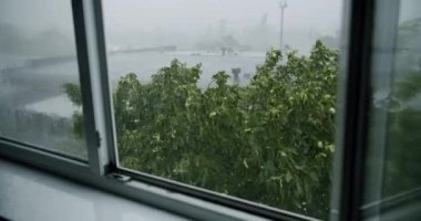 Raining Ice Storm, Torrential Hailstone Rain on Window, Inundation, Flooding, Rainfall, Natural Calamity Disaster Heavy Rainy Day. Torrential Rainstorm With Hail In Urban Residential Street