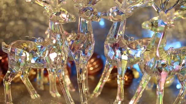 Christmas Figurines Transparent Deer Winter Holiday Decorations Twinkling Garlands Background — Stock Video