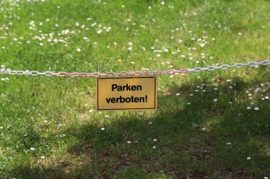 No parking sign. No parking allowed sign. Text in German: No parking.