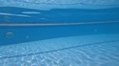 Tiled underwater stairs in the pool.