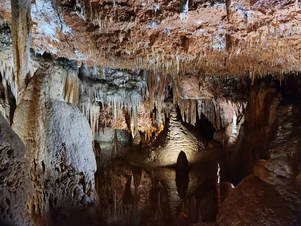 mystical stalagmite fascinating croatian karst cave Grotta Baredine with stalactites and magnetic underground lake