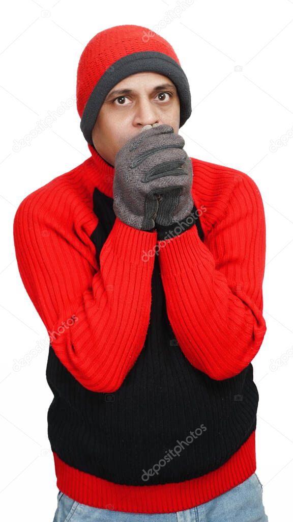 Young Indian Man Wearing a Woolen Cap, Sweater and Hand Gloves, Winter Season, Red and Black Sweater and Cap, Grey Hand Gloves, isolated in White Background