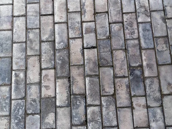 Gri duvarcılık arka planı, asfalt döşeme dokusu 