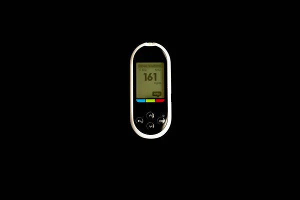 World diabetes dag, gratis glukosmätare på svart bakgrund i ovanifrån. — Stockfoto