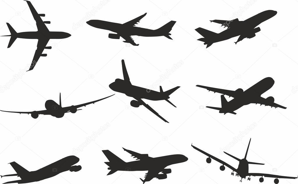 Vector set of passenger aircraft silhouettes. Shadows of iron birds, airplanes, air liners.
