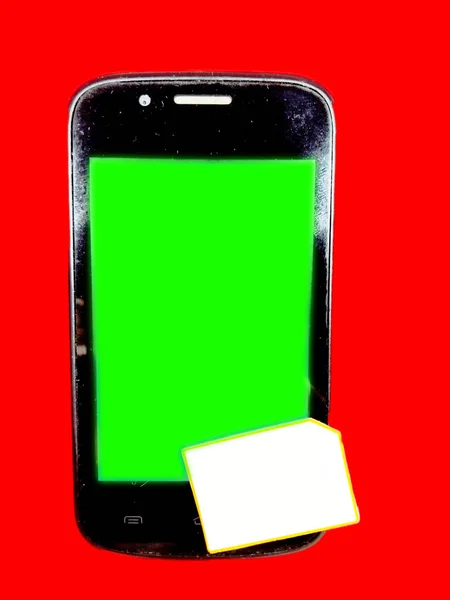 Een Zwarte Smartphone Met Een Groen Scherm Met Een Wit — Stockfoto
