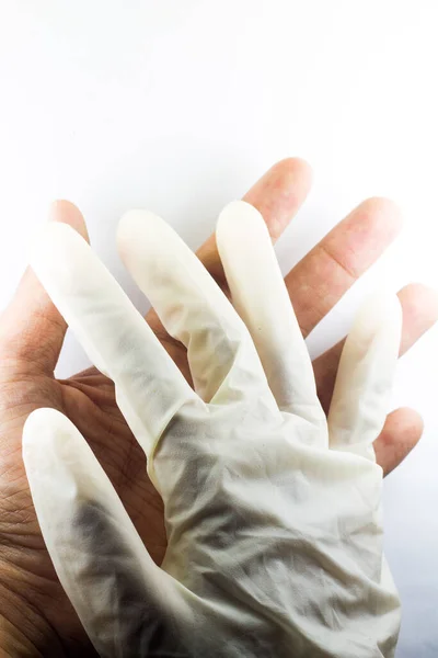 Doctor and patient holding hands on an isolated white background.  support each other