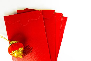 some angpao and chinese lantern on an isolated white background.