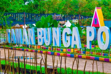 flower garden writing with beautiful colorful designs. poska flower garden, Tabur, Tabalong, South Kalimantan, Indonesia. January 3, 2022.