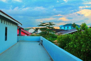 spacious balcony and enjoy the view from above.