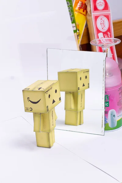 Danbo Looking Mirror Isolated White Background Robot Doll Copy Space — Stock Photo, Image