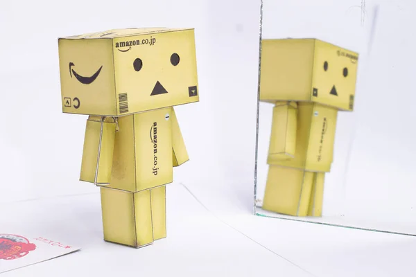 Danbo Sees His Reflection Mirror Isolated White Background Robot Doll — Stock Photo, Image