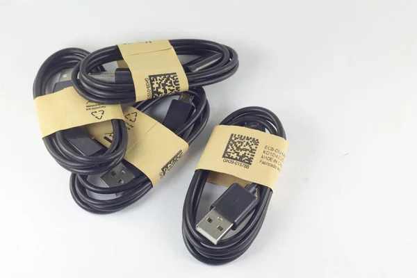 Four Black Micro Usb Cables Isolated White Background Copy Space — Photo