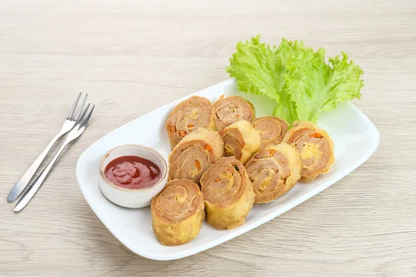 Chicken Egg rolls, made from mixtured minced chicken with tapioca, carrots, scallions and eggs then rolled, steamed and fried