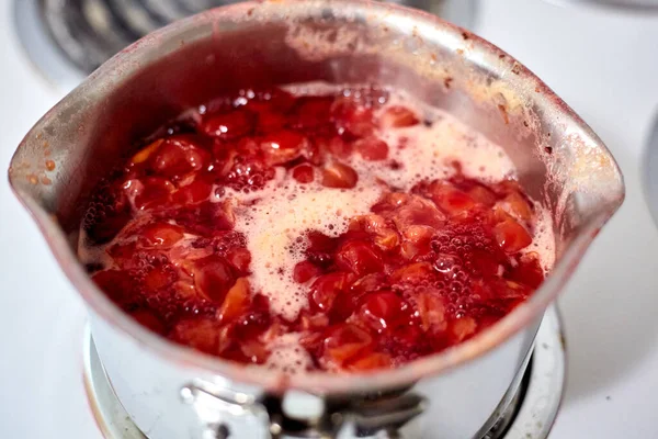 Cherry Compote Boiling Chrome Stock Pot White Electric Stove — Stock Photo, Image