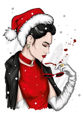 Şık elbiseli ve Noel şapkalı güzel bir kız. Yeni yıl ve Noel, bir kartpostalda baskı.