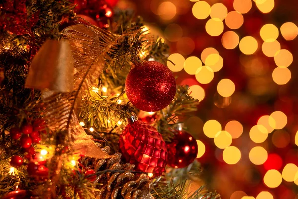 Decorated Christams tree in red and golden colors Stock Photo