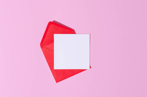 Red envelope with greeting square card mockup invitation on pink background banner. St Valentine, Mothers Day. 