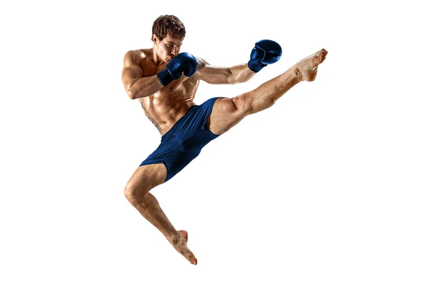 Full size of athlete boxer who perform muay thai martial arts on white background. Sport concept — Stock Photo, Image