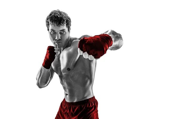 Studio shot of silhouette boxer who training, practicing swing on white background. Red sportswear. — Stock Photo, Image