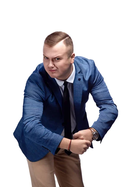 Man in suit showing his muscles and power, struggle, strong will — стоковое фото