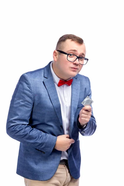 Young Guy Jacket Bow Tie Glasses Holds Condom His Hand — Stock Photo, Image