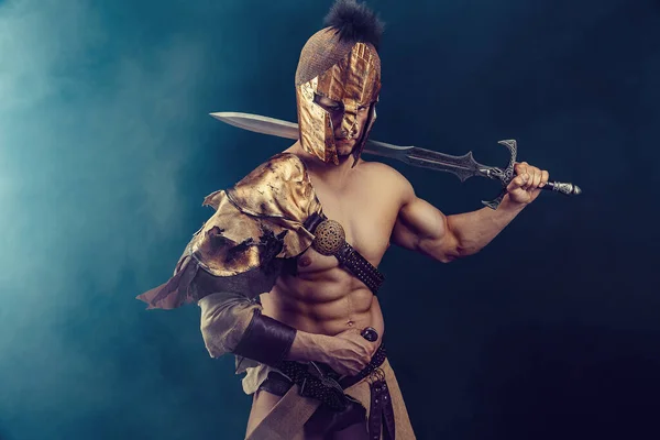 Portrait Handsome Muscular Gladiator Sword Isolated Studio Shot Dark Background —  Fotos de Stock