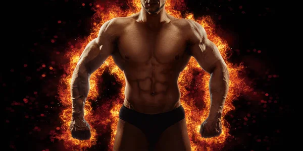 Brutal Strong Athletic Bodybuilder Posing Fire Spark Explosion Background Bodybuilding — 图库照片