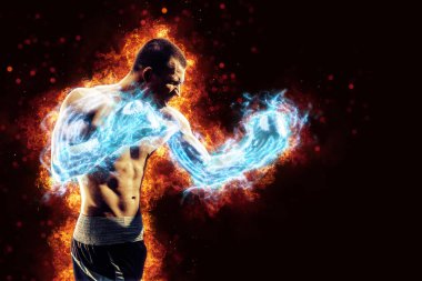 Boxing and fitness concept. Boxer man fighting or posing in gloves on black background with fire. Individual sports recreation. Energy and power. 
