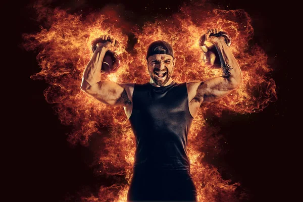 Handsome Bearded Tattooed Bodybuilder Workout Wih Kettlebell Fire Art Concept — Zdjęcie stockowe