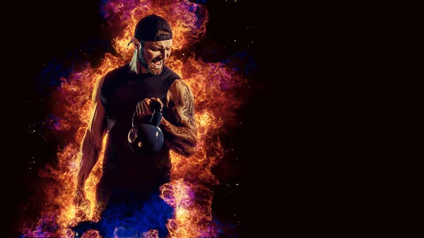 Handsome Bearded Tattooed Bodybuilder Workout Wih Kettlebell Fire Art Concept — Stok fotoğraf