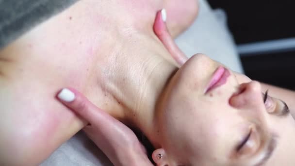 Young Woman Relaxing While Having Pleasant Neck Shoulder Massage Therapist — Stock Video