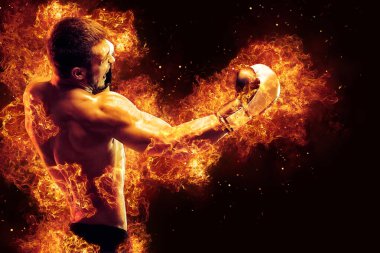 Fighter man punching in fire. 