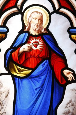 İsa 'nın kutsal kalbi. Lekeli cam pencere. Fransa. 