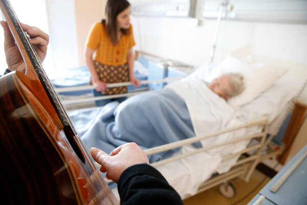 Hospital. Health and medicine.  Music therapy.  France. 