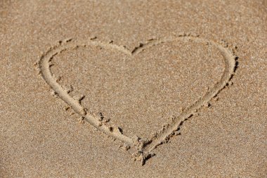 Heart in the sand. West Flanders. Belgium. 