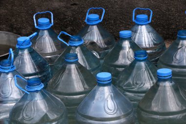Plastic water bottles. Close up.  Congo. 