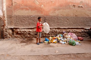 The medina (old town). Child among rubbish.