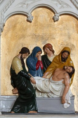 Haçın yolu. İstasyon 14. İsa mezara kondu. Fransa.