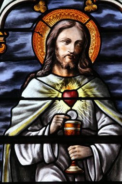 Mezilles Kilisesi. Lekeli cam pencere. İsa 'nın Kutsal Kalbi. Fransa. 