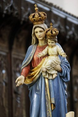  Bakire ve Çocuk. Tahta oyma.