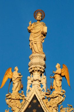 Basilica San Marco.  Statue of St. Mark, the patron of Venice, surrounded by angels. Venice. Italy. 