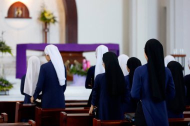 Dominican community.  Catholc nuns  at mass.   Bien Hoa. Vietnam. 