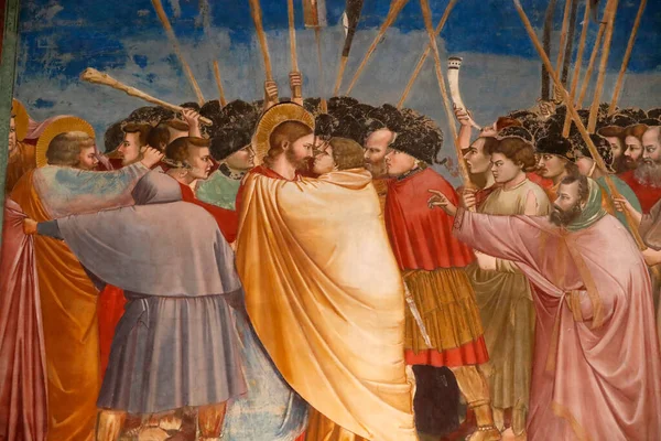 The Scrovegni Chapel. Fresco  by Giotto, 14 th century.  The Kiss of Judas n the Garden of Gethsemane.  Padua. Italy. 