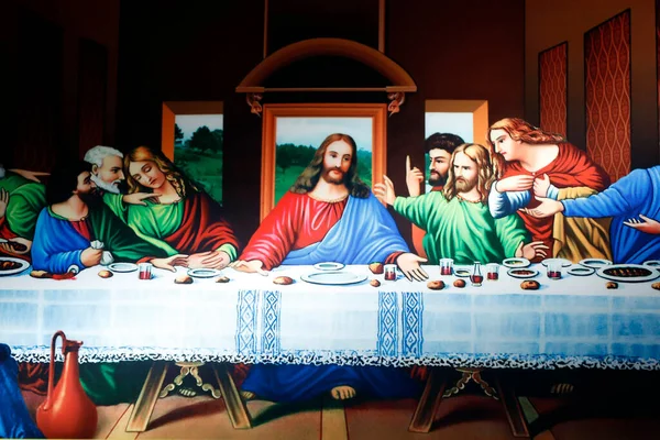 Dini eşyalar satan bir dükkan. Son akşam yemeği. Resim yapmak. Ho Chi Minh Şehri. Vietnam. 