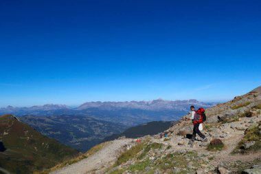 Mountain hiker in summer.  Mont Blanc Massif,  French Alps.  France. 